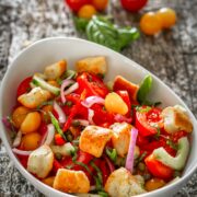 Colorful tomatoes salad in a bowl