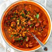 A pot full of delicious beans and sausage stew