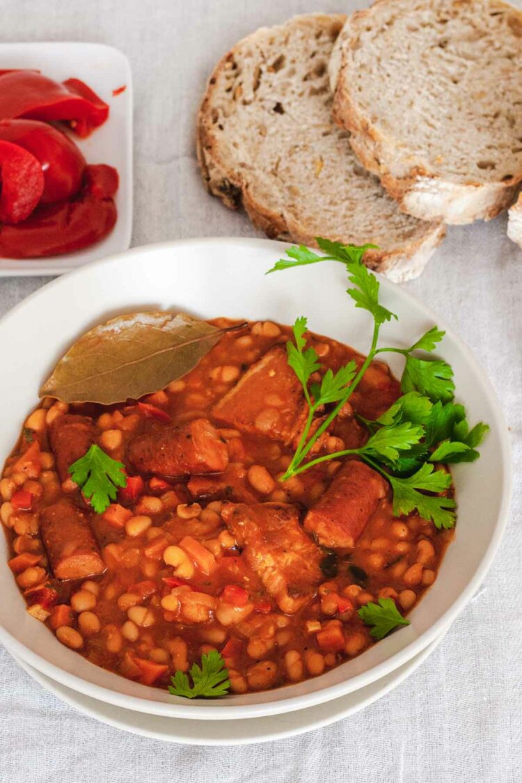 A bowl of the classic beans and sausage Romanian stew